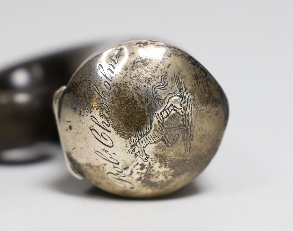 A 19th century white metal mounted horn snuff mull, engraved with name and horse, unmarked, 60mm.